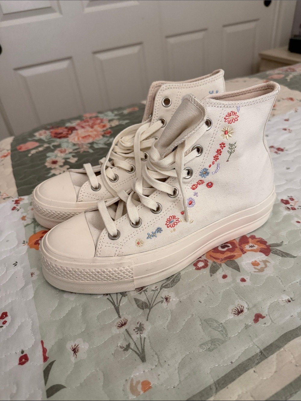 Cream High-Top Converse with Embroidered Floral Accents
